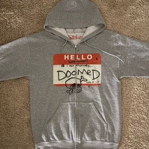 grey zip up hoodie with graphic